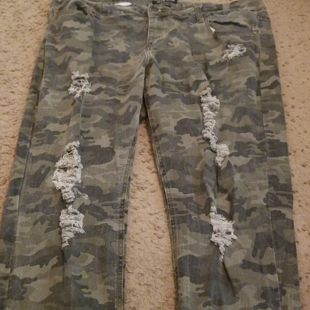 A pair of camouflage jeans.